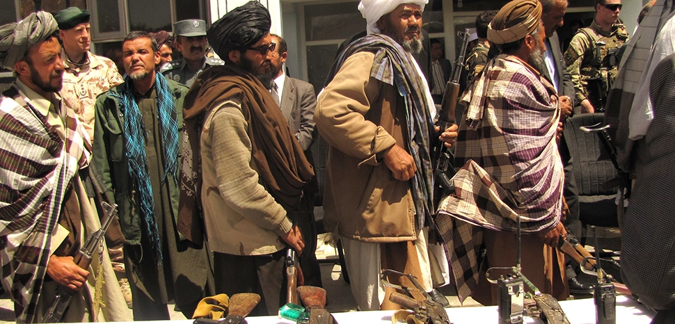                 (Pakistan Taliban not necessarily pictured) cc ISAFmedia, modfiied, https://upload.wikimedia.org/wikipedia/commons/4/42/Former_Taliban_fighters_return_arms.jpg
              