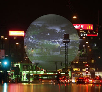 A large globe featuring an interactive display sits in central square in Copenhagen
