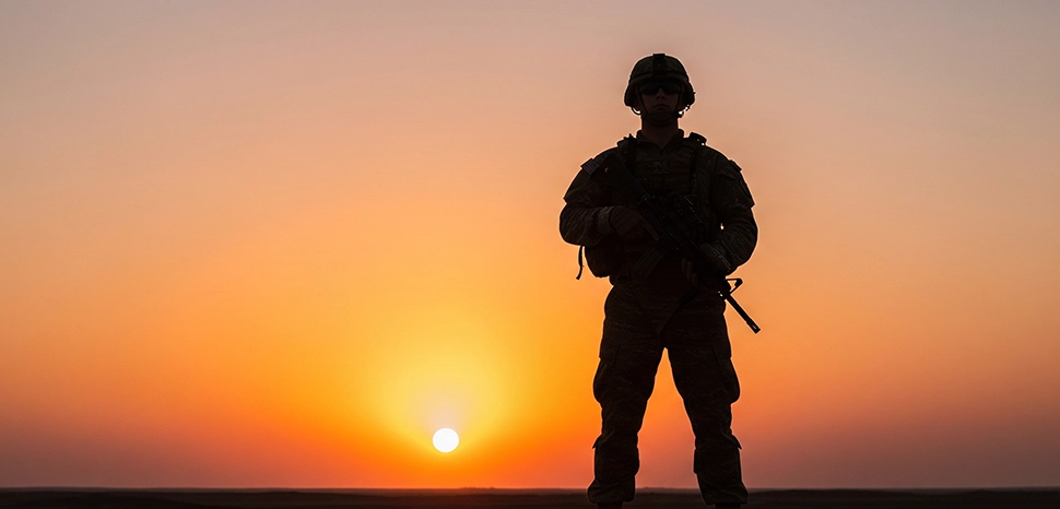                 Representation of a soldier at sunset, Generated by Google Gemini on July 27, 2025.
              