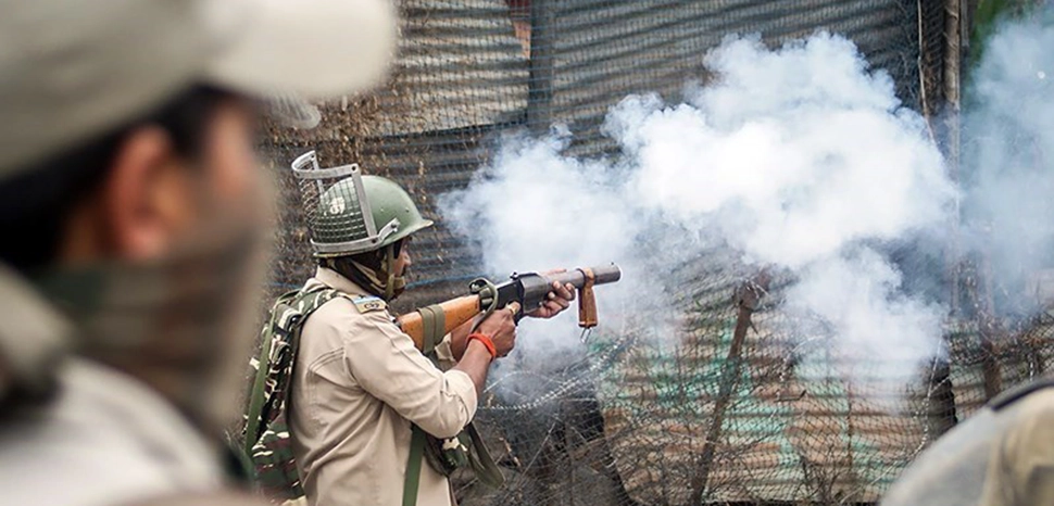                 cc Seyyed Sajed Hassan Razavi, modified, Police, Protesters Clash after Eid Prayers in Kashmir September, 02, 2017 - 14:50 Indian security forces used tear gas and pellet guns to disperse thousands of pro-independence demonstrators following Eid al-Adha (the Feast of Sacrifice) prayers in Kashmir / https://commons.wikimedia.org/wiki/File:Police_Protesters_Clash_after_Eid_Prayers_in_Kashmir_2_Sept_2017_8.jpg
              