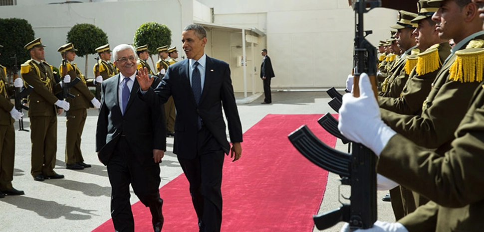                 President Barack Obama and President Mahmoud Abbas of the Palestinian Authority walk past an honor guard at the Mugata Presidential Compound in Ramallah, the West Bank, March 21, 2013. (Official White House Photo by Pete Souza) / https://obamawhitehouse.archives.gov/blog/2013/03/21/president-obama-meets-young-israelis-and-palestinians-second-day-his-middle-east-tri
              