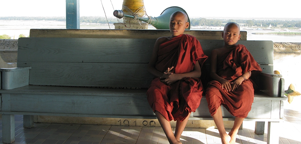 cc Vyacheslav Argenberg, modfiied, Young monks. Boys of Myanmar. Sagaing with numerous Buddhist monasteries is an important religious and monastic centre in Myanmar. Sagaing, Zeyapura, Myanmar. / https://commons.wikimedia.org/wiki/File:Sagaing,_Young_monks,_Boys_of_Myanmar.jpg