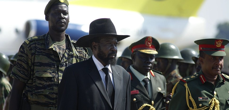                 cc Al Jazeera, modified, https://www.flickr.com/photos/aljazeeraenglish/5322957825 / Salva Kiir, president of semi-autonomous South Sudan, waits to receive Omar al Bashir on his visit to the southern capital Juba., 2011
              