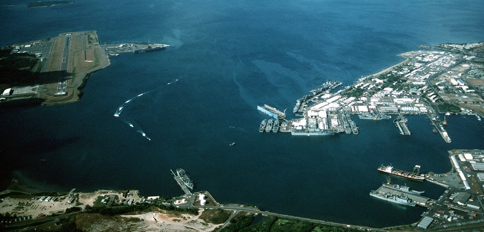                 Aerial view of the U.S. Navy Naval Station Subic Bay, Philippines, circa in 1990, with Naval Air Station Cubi Point visible on the left. / https://en.m.wikipedia.org/wiki/File:NAS_Cubi_Point_and_NS_Subic_Bay.jpg
              