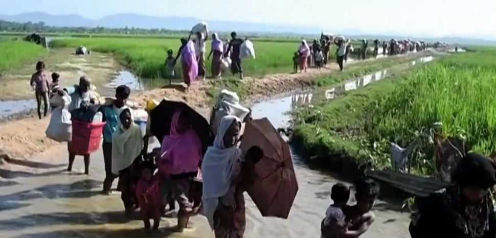 cc VOA, modified, https://en.m.wikipedia.org/wiki/File:Rohingya_refugees_entering_Bangladesh_after_being_driven_out_of_Myanmar,_2017.JPG