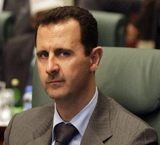 President al-Assad in the better days before the Syrian civil war.