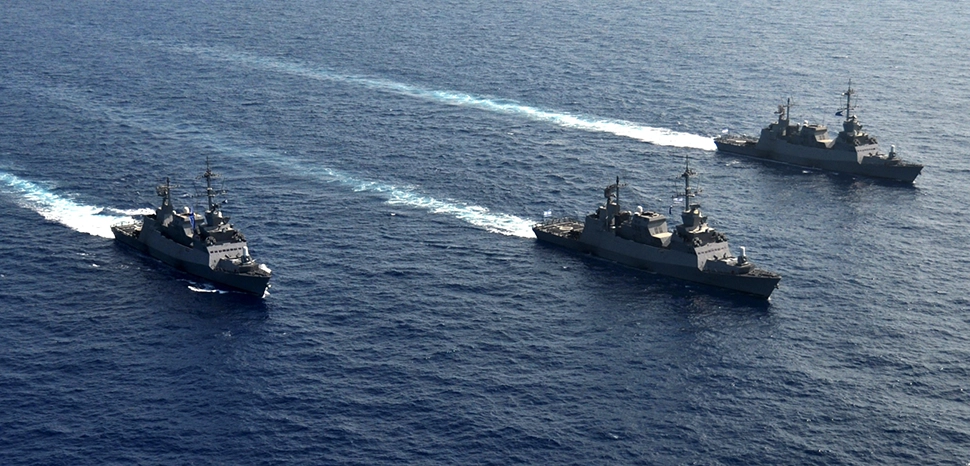                 cc IDF Spokesperson unit, modified, https://commons.wikimedia.org/wiki/File:Three_Sa%27ar_5_Class_Missile_Corvettes_Going_For_a_Cruise.jpg / Three Sa'ar 5 class missile corvettes of the Israeli Navy cruise off the shore of Israel during a training exercise.
              