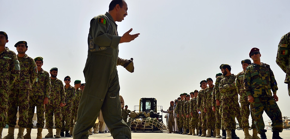 Afghan Air Force 1st Lt. , Shawanaz Nabi Zada, briefs Afghan National Army soldiers and other passengers prior to the first-ever all Afghan C-130 flight, Kabul, Afghanistan, June 16, 2014. The aircrew, made up of six AAF pilots and loadmasters, successfully completed a mission from Kabul to Kandahar and back. The aircrew successfully planned, executed and accounted for movement of about 120 Afghan personnel, two casualty evacuation patients, luggage and cargo in both directions. The ability for the AAF aircrew to move Afghan National Army Security Forces personnel, cargo, CASEVAC patients and human remains missions is a major accomplishment for both the AAF and NATO Air Training Command – Afghanistan advisors assigned to the 438th Air Expeditionary Wing. This milestone was accomplished eight months earlier than projected. (U.S. Air Force photo by Staff Sgt. Vernon Young Jr.) / https://www.afcent.af.mil/News/Article/500183/afghan-air-force-completes-first-ever-c-130-flight/