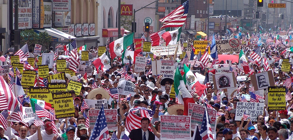                cc Jonathan McIntosh / May Day immigration march from 2006 / https://commons.wikimedia.org/wiki/File:May_Day_Immigration_March_LA03.jpg
              