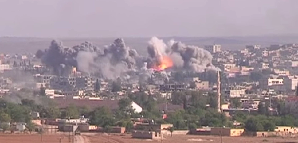                 cc VOA, allied airstrikes on Kobane, modified, https://commons.wikimedia.org/wiki/File:Coalition_Airstrike_on_ISIL_position_in_Kobane.jpg
              