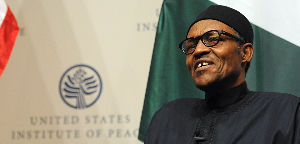 cc US Institute of Peace, modified, The President of Nigeria, His Excellency Muhammadu Buhari, gave remarks and answered questions at the U.S. Institute of Peace on July 22, during his first visit to the United States since taking office. https://www.flickr.com/photos/usipeace/19965148362
