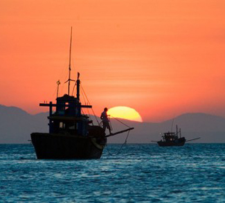 Fishing boat on the South China Sea, cc Flickr Times Asl, modified, https://creativecommons.org/licenses/by/2.0/