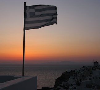 Greek flag at sunset, cc Flickr, Fred Hsu