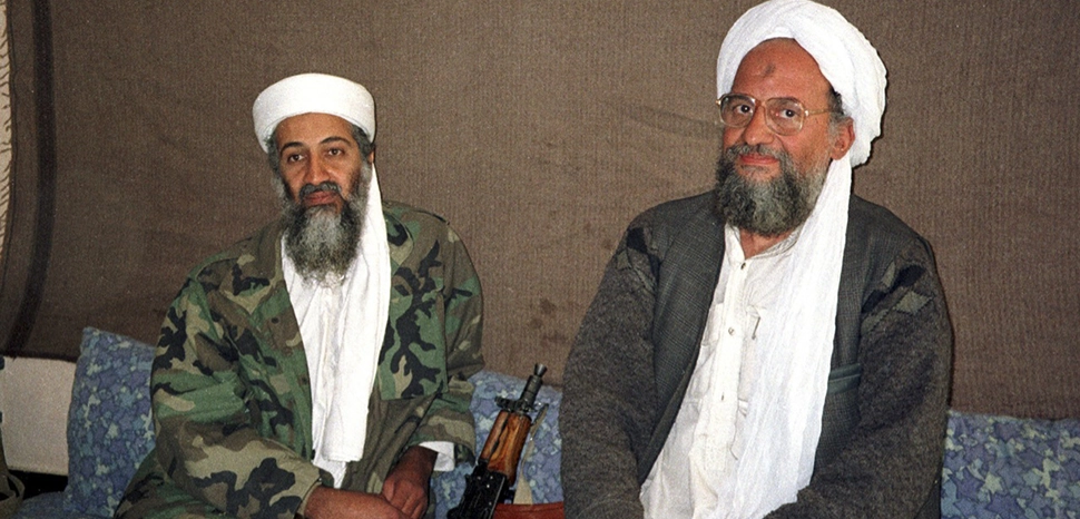 cc Osama bin Laden sits with his adviser Ayman al-Zawahiri during an interview with Pakistani journalist Hamid Mir. Hamid Mir took this picture during his third and last interview with Osama bin Laden in November 2001 in Kabul. Ayman al-Zawahri was present in this interview and acted as the translator of Osama bin Laden. / cc Hamid Mir, modified, https://commons.wikimedia.org/wiki/File:Hamid_Mir_interviewing_Osama_bin_Laden_and_Ayman_al-Zawahiri_2001.jpg
