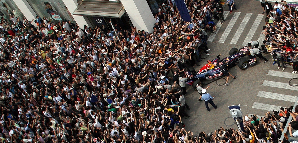                 cc Morio, modified, https://commons.wikimedia.org/wiki/File:Sebastien_Buemi_demonstrating_the_showcar_to_the_crowd_2011_Red_Bull_Energy_for_Japan.jpg
              