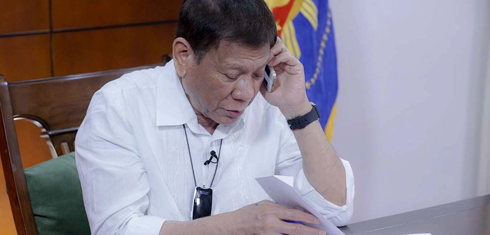                 cc ARMAN BAYLON/PRESIDENTIAL PHOTO, modified, President Rodrigo Roa Duterte talks on the phone with Indian Prime Minister Narendra Modi at the Presidential Guest House in Panacan, Davao City on June 9, 2020. With the President are Senator Christopher “Bong” Go and Presidential Assistant on Foreign Affairs and Chief of Presidential Protocol Robert Borje. / https://commons.wikimedia.org/wiki/File:President_Rodrigo_Roa_Duterte_talks_on_the_phone_with_Indian_Prime_Minister_Narendra_Modi_02.jpg
              