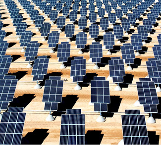 By U.S. Air Force photo/Airman 1st Class Nadine Y. Barclay - NELLIS AIR FORCE BASE website - Solar panels connect to base electric gridorignial image, Public Domain, https://commons.wikimedia.org/w/index.php?curid=3268675