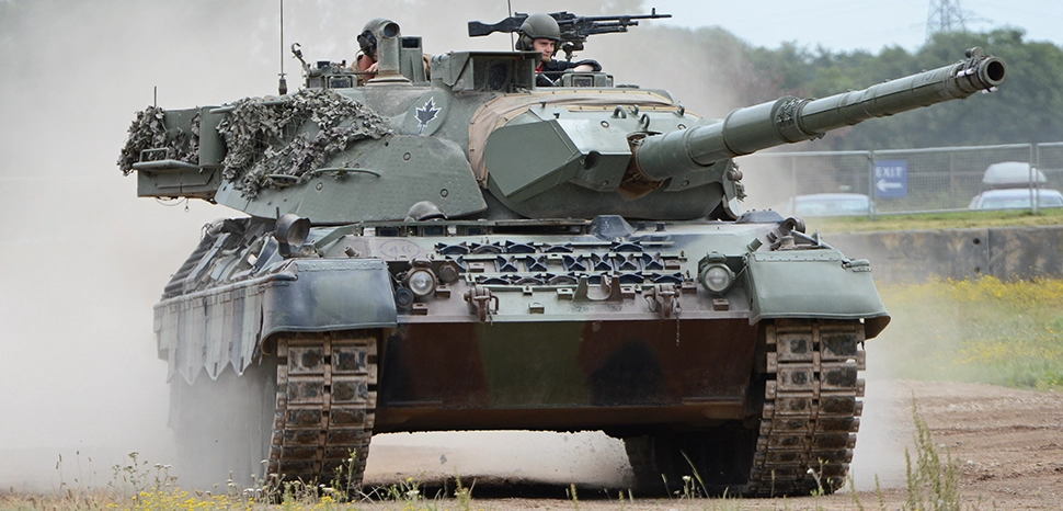                 cc Alan Wilson from Stilton, Peterborough, Cambs, UK, modified, Leopard 1A5 Main Battle Tank. Chassis serial No 18016. Turret serial No 0020A. Canadian Army registration 78-85137. One of two donated to the museum directly from the Canadian Army. Seen during a demonstration at The Tank Museum, Bovington, Dorset, UK. / https://commons.wikimedia.org/wiki/File:Ex_Canadian_Leopard_C2_%E2%80%98137%E2%80%99_%2828712416021%29.jpg
              
