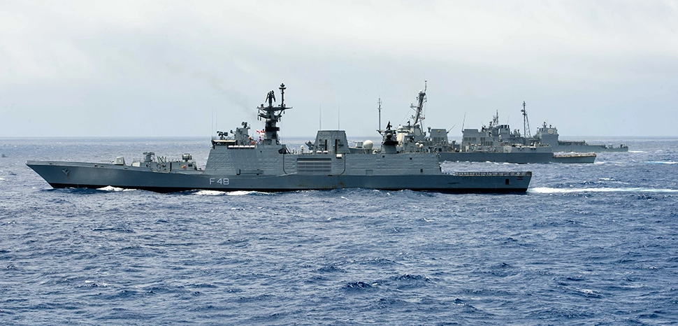 cc Mass Communication Specialist 2nd Class Ryan J. Batchelder, modified, https://commons.wikimedia.org/wiki/File:Ships_from_the_Indian_navy,_Japan_Maritime_Self-Defense_Force_and_U.S._Navy_are_underway_together_during_a_group_sail_signifying_the_end_of_Malabar_2016.jpg