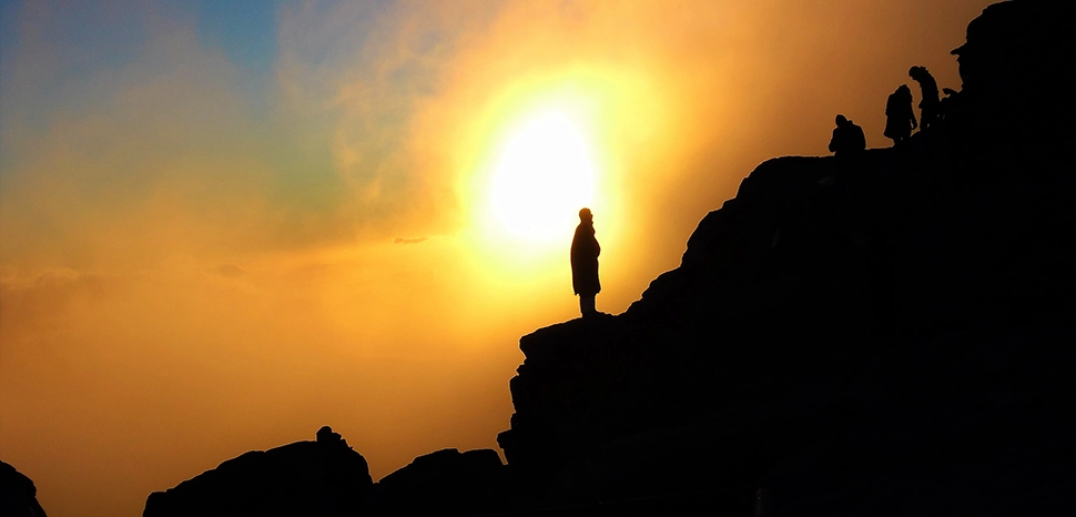 cc Sara Nabih, modified, Sunrise from the summit of mount Sinai the Sinai Peninsula of Egypt. https://commons.wikimedia.org/wiki/File:Sunrise_from_the_summit_of_Mount_Sinai_or_Gabal_Musa.jpg