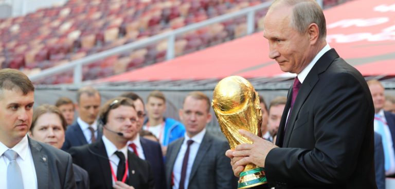 Vladimir_Putin_FIFA_World_Cup_Trophy_Tour_kick-off_ceremony, modified www.kremlin.ru