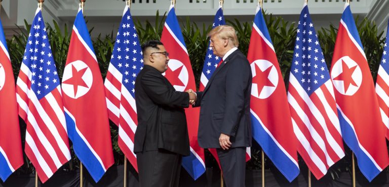 The first Trump-Kim summit in Singapore, modified, https://commons.wikimedia.org/wiki/File:Kim_and_Trump_shaking_hands_at_the_red_carpet_during_the_DPRK%E2%80%93USA_Singapore_Summit.jpg
