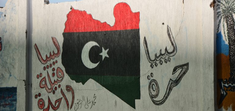Libya Flag grafitti, cc Ben Sutherland Flickr, modfied, https://creativecommons.org/licenses/by/2.0/