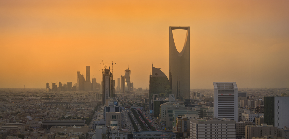 Riyadh Skyline, cc B.alotaby, modified, https://commons.wikimedia.org/wiki/File:Riyadh_Skyline_showing_the_King_Abdullah_Financial_District_(KAFD)_and_the_famous_Kingdom_Tower_.jpg