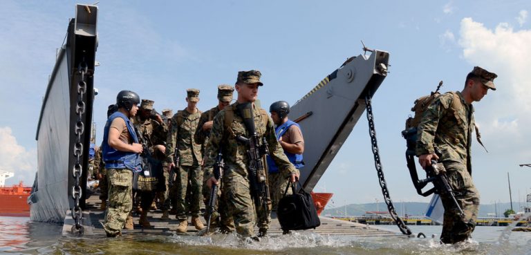130627-N-YU572-174 SUBIC BAY, Philippines (June 27, 2013) - Sailors and Marines disembark landing craft utility (LCU) 1633 to support Cooperation Afloat Readiness and Training (CARAT) Philippines 2013. More than 600 Sailors and Marines are participating in CARAT Philippines 2013. U.S. Navy ships participating in CARAT Philippines include the guided missile destroyer USS Fitzgerald (DDG 62), with embarked Destroyer Squadron (DESRON) 7 staff, the amphibious dock landing ship USS Tortuga (LSD 46) with embarked U.S. Marine Corps landing force, and the diving and salvage vessels USNS Safeguard (T-ARS 50) and USNS Salvor (T-ARS 52) with embarked Mobile Diving and Salvage Unit (MDSU) 1. CARAT is a series of bilateral military exercises between the U.S. Navy and the armed forces of Bangladesh, Brunei, Cambodia, Indonesia, Malaysia, the Philippines, Singapore, Thailand and Timor Leste. (U.S. Navy photo by Mass Communication Specialist 1st Class Jay C. Pugh) (RELEASED), cc Flickr Cooperation Afloat Readiness and Training (CARAT) Commander, Logistics Group Western Pacific, modified, https://creativecommons.org/licenses/by/2.0/