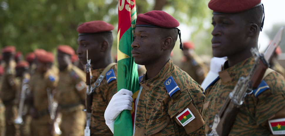 BurkinaFasoFlintlock2019, Members of the Burkinabe honor guard stand ready to be called to attention before the opening ceremony of Flintlock 2019, in Ouagadougou, Burkina Faso. Flintlock is an annual African-led, integrated military and law enforcement exercise that has strengthened key partner nation forces throughout North and West Africa as well as western special operations forces since 2005. (U.S. Navy photo by MC2 (SW/AW) Evan Parker / released), https://www.africom.mil/media-room/article/31543/more-than-30-nations-kick-off-flintlock-2019-in-burkina-faso-mauritania