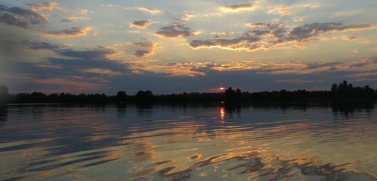 Sunset over the Dnieper River, which once met most of Crimea's water needs,, cc Flickr tuyddatygl, modified, https://creativecommons.org/licenses/by-sa/2.0/