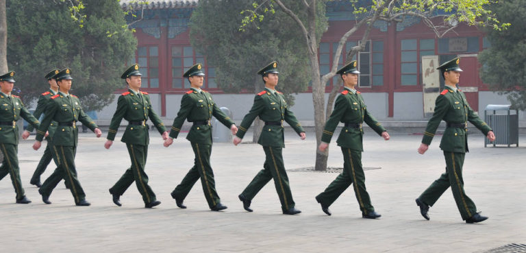 Chinese Guards Tiananmen Square, CC Flickr, Peter MacKey, Modified, https://www.flickr.com/photos/silverback40/10732678883/, https://creativecommons.org/licenses/by-nd/2.0/