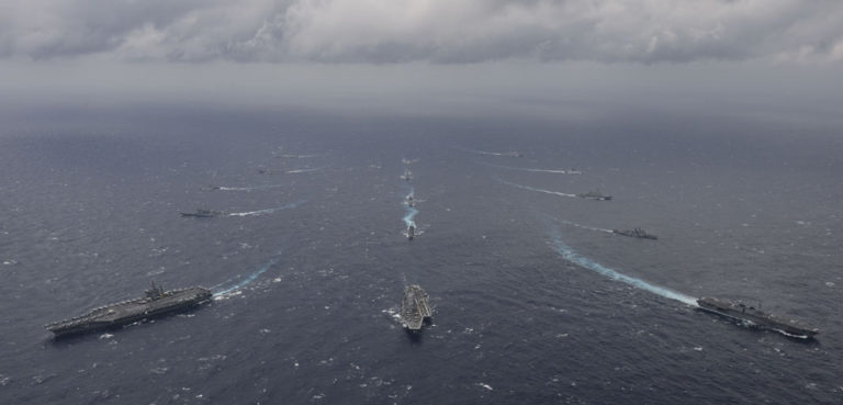 BAY OF BENGAL (July 17, 2017) Ships from the Indian Navy, Japan Maritime Self-Defense Force (JMSDF) and the U.S. Navy sail in formation, July 17, 2017, in the Bay of Bengal as part of Exercise Malabar 2017. Malabar 2017 is the latest in a continuing series of exercises between the Indian Navy, JMSDF and U.S. Navy that has grown in scope and complexity over the years to address the variety of shared threats to maritime security in the Indo-Asia-Pacific region. (U.S. Navy photo by Mass Communication Specialist 3rd Class Cole Schroeder), cc Flickr ermaleksandr, modified, https://creativecommons.org/publicdomain/mark/1.0/