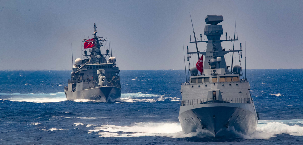 MEDITERRANEAN SEA (Aug. 26, 2020) The Arleigh Burke-class guided-missile destroyer USS Winston S. Churchill (DDG 81), not pictured, executes a passing exercise with Turkish Navy frigates TCG Barbaros (F-244) and Burgazada (F-513) in the Mediterranean Sea, Aug. 26, 2020. Winston S. Churchill is deployed to the U.S. 6th Fleet area of operations in support of regional allies and partners and U.S. national security interests in Europe and Africa., modified, cc Flickr Commander, U.S. Naval Forces Europe-Africa/U.S. 6th Fleet, https://www.flickr.com/photos/cne-cna-c6f/50271831981/in/photolist-2jAmhcP-2haMApM-2haNErD-2gaP4QR-2hD6juY-RH5CUJ-2bF67ti-VxBNes-2hGRkqA-HCFGuD-2hqdMu5-2gEg8cf-2gUiawX-2hDgcCX-SZ1JT1-2gaN4qq-2hqfRnp-2gVhEXN-2hGDfKh-2haMAkF-2hFdvj2-2hGn39m-znkBA5-2gUirnE-2hDctte-2haQaMz-2hFnDn3-H43vF2-2gaNDEb-2gaN4jh-2gWgQxW-2hrHEYA-2hqchm2-2g5ya9R-2hHNyyf-2hFoA2d-2haRtoR-2haRirw-2hmSiv2-2gaNhSi-BdTSWE-2hGy2zf-2gaNooQ-2h5oRbS-2hFnuSh-2ghxo1s-2g5DKwy-2hrMBEh-24qHQwD-2cRhAAQ