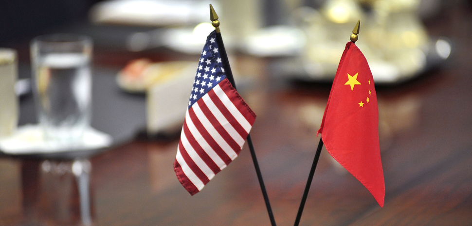 The American and Chinese flags stand at center table before U.S. Deputy Defense Secretary Ashton B. Carter welcomes Cai Yingting, Chinese deputy chief of the General Staff of the People's Liberation Army, to a meeting at the Pentagon, Aug. 23, 2012., cc modified, https://commons.wikimedia.org/wiki/File:Defense.gov_photo_essay_120823-D-NI589-007.jpg