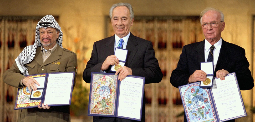 he Nobel Peace Prize laureates for 1994 in Oslo. From left to right: PLO Chairman Yasser Arafat, Israeli Foreign Minister Shimon Peres, Israeli Prime Minister Yitzhak Rabin, cc Government Press Office, modified, https://commons.wikimedia.org/wiki/File:Flickr_-_Government_Press_Office_(GPO)_-_THE_NOBEL_PEACE_PRIZE_LAUREATES_FOR_1994_IN_OSLO..jpg