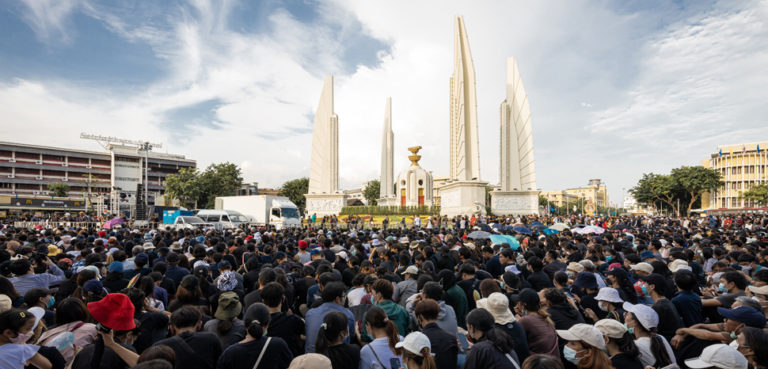 The protests on August 16, 2020 in a large demonstration organized under the Free Youth umbrella (Thai: เยาวชนปลดแอก; RTGS: yaowachon plot aek) at the Democracy Monument in Bangkok., cc Supanut Arunoprayote, modified, https://commons.wikimedia.org/w/index.php?sort=last_edit_desc&search=bangkok+protest+filetype%3Abitmap&title=Special%3ASearch&profile=advanced&fulltext=1&advancedSearch-current=%7B%22fields%22%3A%7B%22filetype%22%3A%22bitmap%22%7D%7D&ns0=1&ns6=1&ns14=1#/media/File:Protest_in_2020_Democracy_Monument_(I).jpg