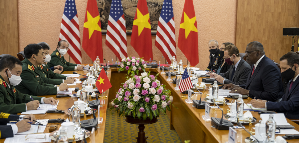 Secretary of Defense Lloyd J. Austin III and Vietnamese Defense Minister Phan Van Giang enter conduct bi-lateral discussions at the Vietnam Ministry of Defense, Hanoi, Vietnam, July 29, 2021. Austin is on a week-long trip to reaffirm defense relationships and conduct bilateral meetings with senior officials in Vietnam, Singapore and Manila, Philippines. (DoD photo by Chad J. McNeeley), cc U.S. Secretary of Defense, modified, https://www.flickr.com/photos/secdef/51343158874/in/photostream/rg/licenses/by/2.0/