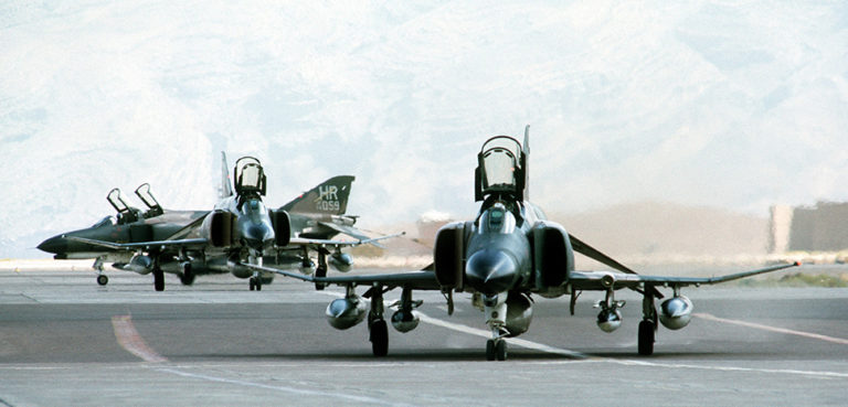 USAF F-4s on an airbase in Iran, 1977 - cc USAF, modified - https://en.wikipedia.org/wiki/Baghdad_Pact#/media/File:F-4Es_50th_TFW_in_Iran_1977.JPEG