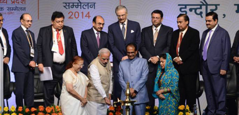 cc PM inaugurates ‘Invest Madhya Pradesh – Global Investors Summit 2014′, modified, https://commons.wikimedia.org/w/index.php?title=Special%3ASearch&redirs=0&search=adani%20modi&fulltext=Search&ns0=1&ns6=1&ns14=1&title=Special%3ASearch&advanced=1&fulltext=Advanced+search#/media/File:PM_Modi_inaugurates_%22Invest_Madhya_Pradesh_%E2%80%93_Global_Investors_Summit_2014%22.jpg