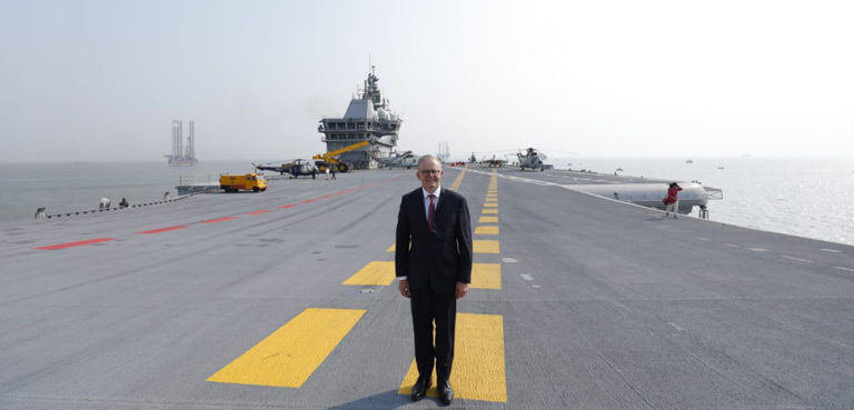 cc Government of India, modified, The Prime Minister of Australia Hon Anthony Albanese on his visit to #India, embarked the indigenous aircraft carrier INS Vikrant at Mumbai. He was received onboard by Adm R Hari Kumar CNS with a Guard of Honour. https://commons.wikimedia.org/w/index.php?search=Albanese+Vikrant&title=Special:Search&profile=advanced&fulltext=1&ns0=1&ns6=1&ns12=1&ns14=1&ns100=1&ns106=1#/media/File:Prime_Minister_of_Australia_Anthony_Albanese_embarked_the_indigenous_aircraft_carrier_INS_Vikrant.jpg