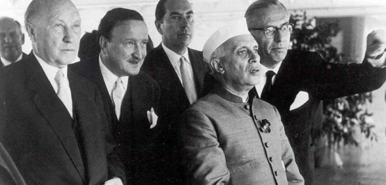 cc Unknown author, modified, https://commons.wikimedia.org/w/index.php?limit=500&offset=0&profile=default&search=nehru&title=Special:Search&ns0=1&ns6=1&ns12=1&ns14=1&ns100=1&ns106=1#/media/File:Hermann_Josef_Abs_-_mit_Adenauer_und_Nehru_1956.jpg