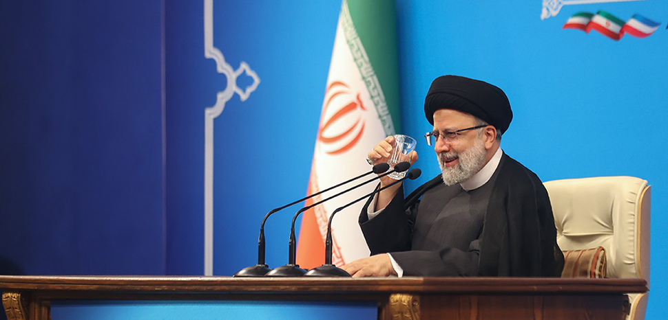                 cc wikicommons, Farsnews, modified, https://commons.wikimedia.org/w/index.php?search=Ebrahim%20Raisi&ns0=1&ns6=1&ns12=1&ns14=1&ns100=1&ns106=1#/media/File:%D8%B1%DB%8C%DB%8C%D8%B3%DB%8C_Ebrahim_Raisi_drink_water.jpg
              