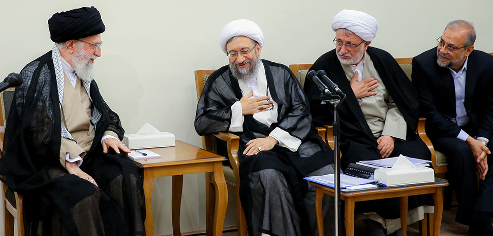 Ali Khamenei with Sadeq Larijani in June 2018; cc Khamenei.ir, modified, https://commons.wikimedia.org/w/index.php?search=iran%20supreme%20leader&ns0=1&ns6=1&ns12=1&ns14=1&ns100=1&ns106=1#/media/File:Ali_Khamenei_with_Sadeq_Larijani_in_June_2018.jpg