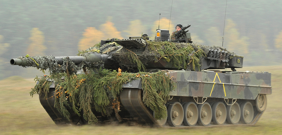                 cc U.S. Army Europe photo by Visual Information Specialist Markus Rauchenberger, modified, A German Army Leopard II tank, assigned to 104th Panzer Battalion, moves through the Joint Multinational Readiness Center during Saber Junction 2012 in Hohenfels, Germany, Oct. 25. The U.S. Army Europe's exercise Saber Junction trains U.S. personnel and 1800 multinational partners from 18 nations ensuring multinational interoperability and an agile, ready coalition force. (U.S. Army Europe photo by Visual Information Specialist Markus Rauchenberger/released), https://commons.wikimedia.org/wiki/File:German_Army_Leopard_2A6_tank_in_Oct._2012.jpg
              