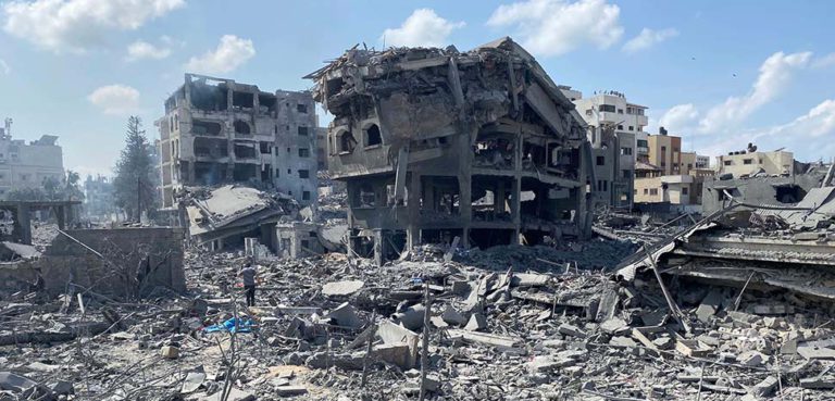 cc Palestinian News & Information Agency (Wafa) in contract with APAimages, modified, https://en.wikipedia.org/wiki/Israel%E2%80%93Hamas_war#/media/File:Damage_in_Gaza_Strip_during_the_October_2023_-_32.jpg