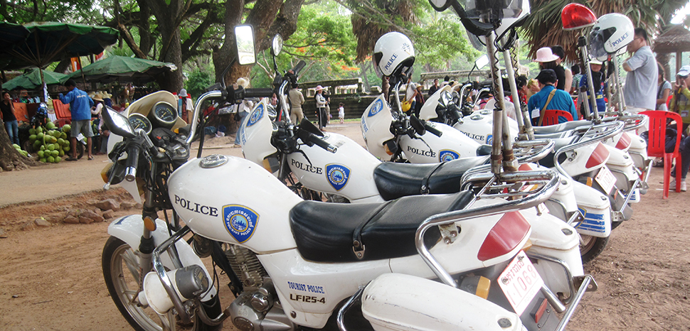                 cc Dickelbers, modified, https://commons.wikimedia.org/wiki/File:Police_motorcycles_in_Cambodia_02.JPG
              