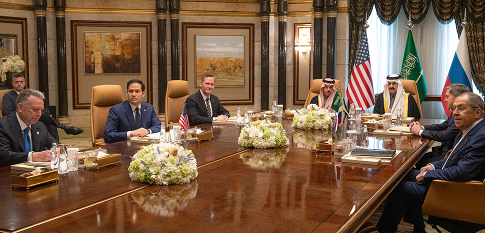                 Secretary Marco Rubio, with from left, U.S. Middle East envoy Steve Witkoff, National Security Advisor Mike Waltz, Saudi Arabia's Foreign Minister Prince Faisal bin Farhan al-Saud, National Security Advisor Mosaad bin Mohammad al-Aiban, the Russian president's foreign policy advisor Yuri Ushakov, and Russia's Foreign Minister Sergei Lavrov attend a meeting together at Diriyah Palace in Riyadh, Saudi Arabia, February 18, 2025. (Official State Department photo by Freddie Everett), cc US Department of State, modified
              